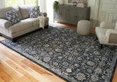 A2Z Furniture - Ashley Furniture - Hilcott Rug - 5'3" x 7'3" Rug / Blue/Cream/Brown - R406112